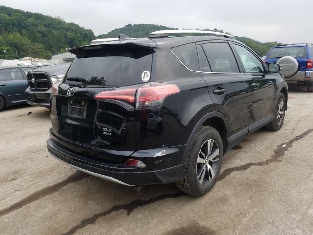 Photo 3 VIN: 2T3RFREV4GW528712 - TOYOTA RAV4 XLE 