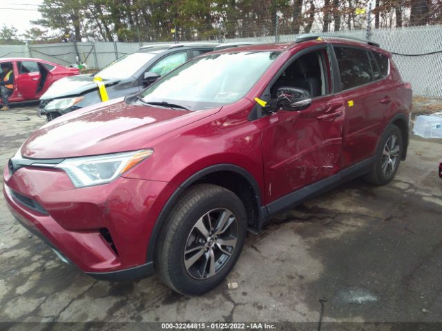 Photo 1 VIN: 2T3RFREV4JW747595 - TOYOTA RAV4 