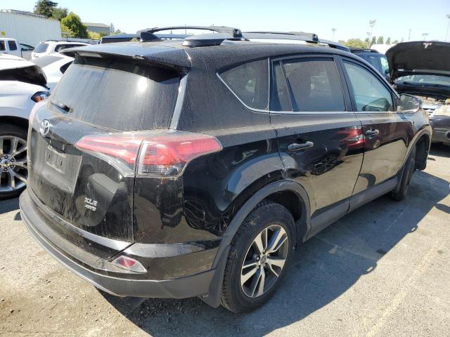 Photo 2 VIN: 2T3RFREV5HW567049 - TOYOTA RAV4 XLE 