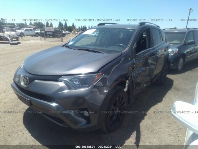 Photo 1 VIN: 2T3RFREV5JW725556 - TOYOTA RAV4 