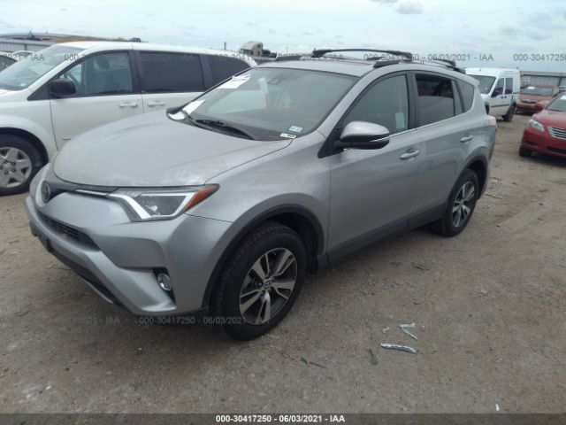 Photo 1 VIN: 2T3RFREV5JW818173 - TOYOTA RAV4 