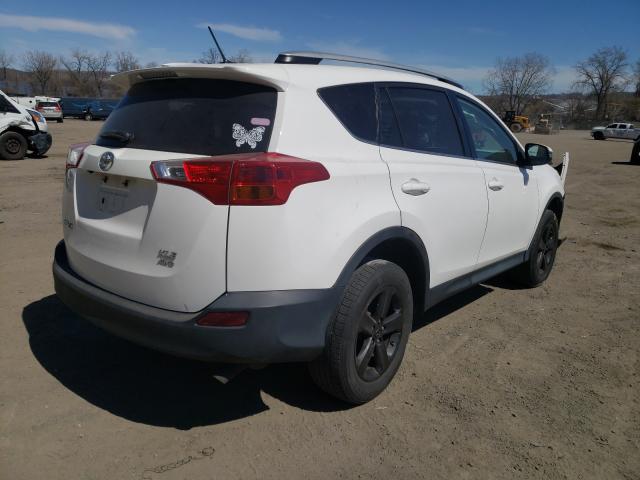 Photo 3 VIN: 2T3RFREV6FW390833 - TOYOTA RAV4 XLE 