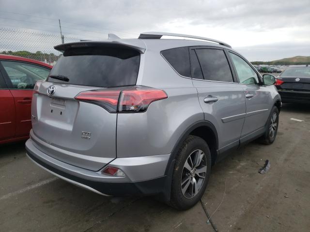 Photo 3 VIN: 2T3RFREV6GW476077 - TOYOTA RAV4 XLE 