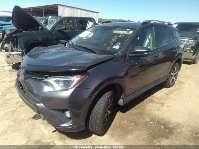 Photo 1 VIN: 2T3RFREV6JW706868 - TOYOTA RAV4 