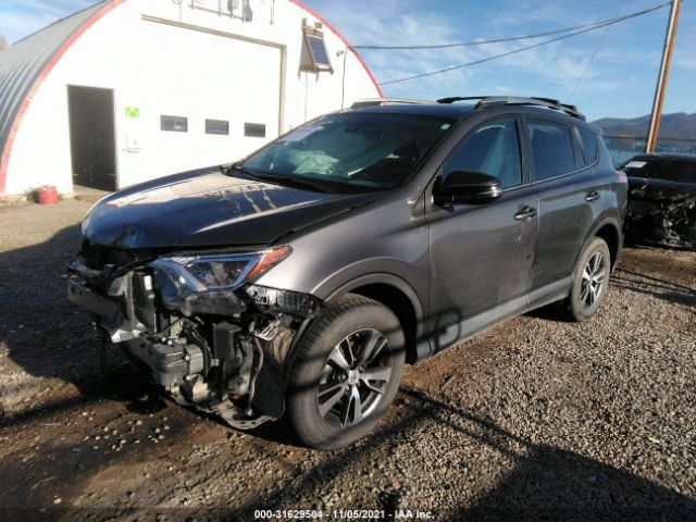 Photo 1 VIN: 2T3RFREV7JW707530 - TOYOTA RAV4 