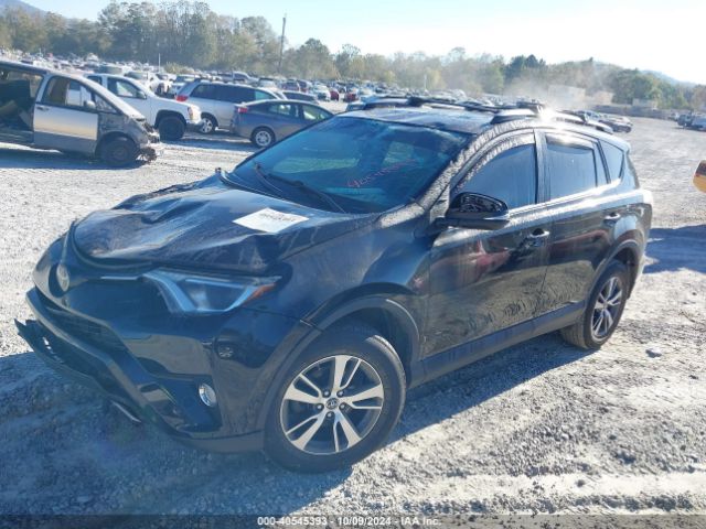 Photo 1 VIN: 2T3RFREV7JW734811 - TOYOTA RAV4 