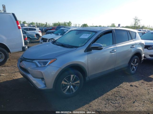 Photo 1 VIN: 2T3RFREV7JW749633 - TOYOTA RAV4 