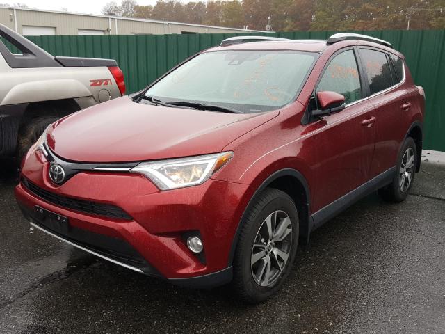 Photo 1 VIN: 2T3RFREV7JW749891 - TOYOTA RAV4 