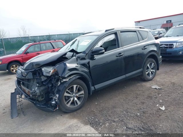 Photo 1 VIN: 2T3RFREV7JW781921 - TOYOTA RAV4 