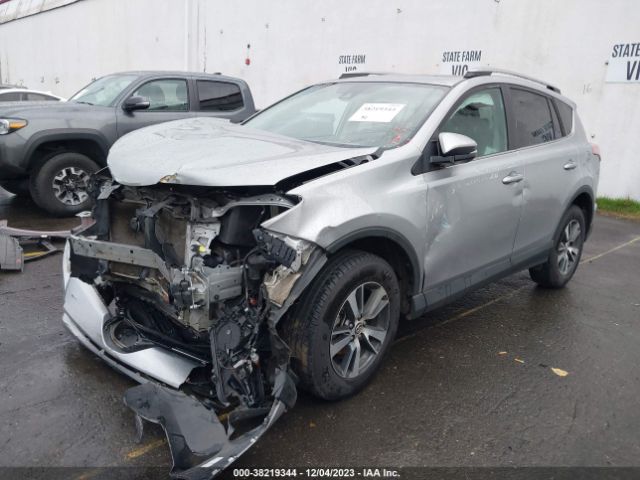 Photo 1 VIN: 2T3RFREV7JW786066 - TOYOTA RAV4 