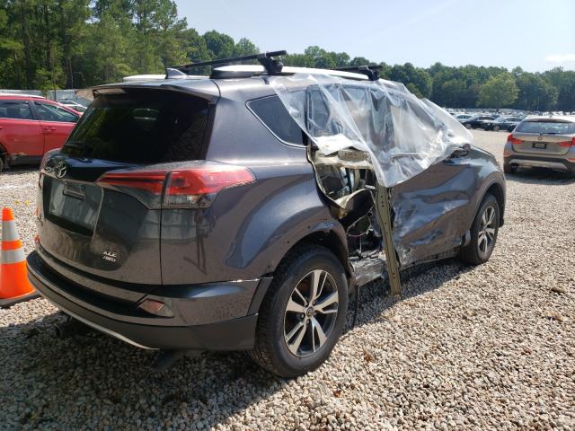 Photo 3 VIN: 2T3RFREV8GW487677 - TOYOTA RAV4 XLE 