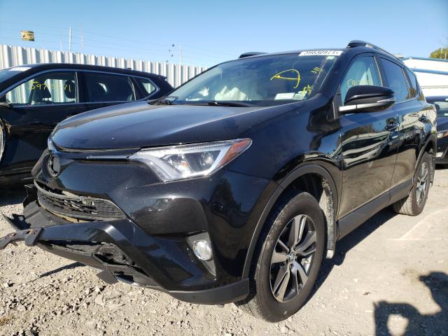 Photo 1 VIN: 2T3RFREV8HW670398 - TOYOTA RAV4 XLE 