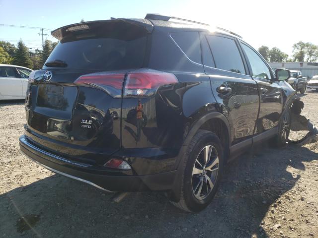 Photo 3 VIN: 2T3RFREV8HW670398 - TOYOTA RAV4 XLE 