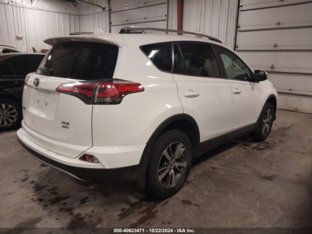 Photo 3 VIN: 2T3RFREV8JW723560 - TOYOTA RAV4 