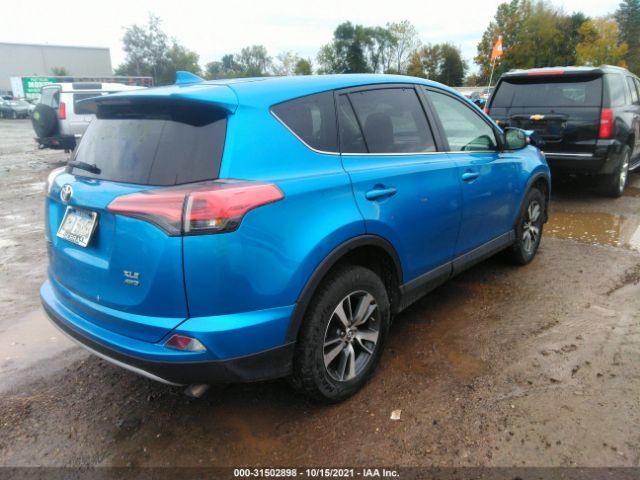 Photo 3 VIN: 2T3RFREV8JW754582 - TOYOTA RAV4 