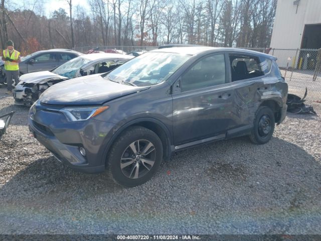 Photo 1 VIN: 2T3RFREV8JW757871 - TOYOTA RAV4 