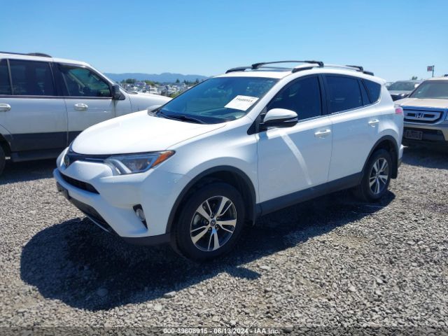 Photo 1 VIN: 2T3RFREV8JW851622 - TOYOTA RAV4 