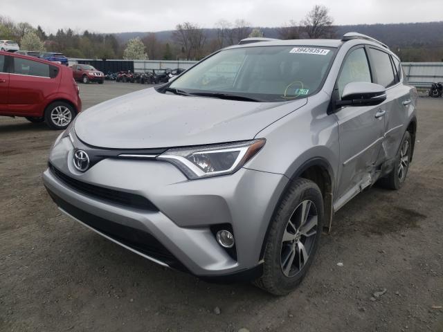 Photo 1 VIN: 2T3RFREV9GW515230 - TOYOTA RAV4 XLE 