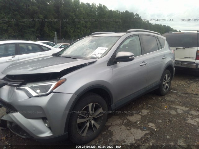 Photo 1 VIN: 2T3RFREV9JW725852 - TOYOTA RAV4 