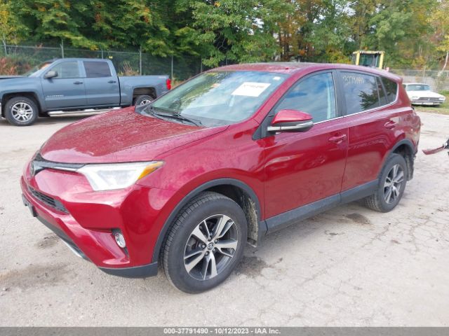 Photo 1 VIN: 2T3RFREV9JW739279 - TOYOTA RAV4 