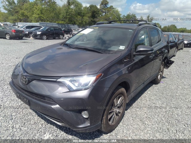 Photo 1 VIN: 2T3RFREV9JW740433 - TOYOTA RAV4 