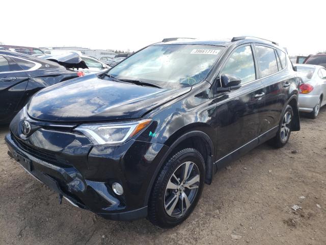 Photo 1 VIN: 2T3RFREV9JW840094 - TOYOTA RAV4 