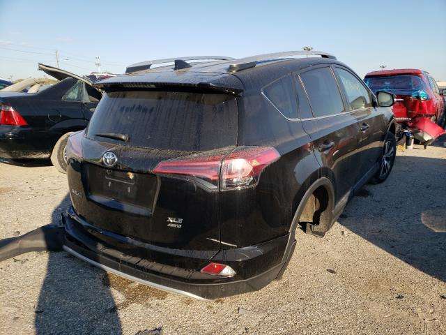 Photo 3 VIN: 2T3RFREVXGW421924 - TOYOTA RAV4 XLE 