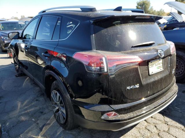 Photo 2 VIN: 2T3RFREVXGW470055 - TOYOTA RAV4 XLE 