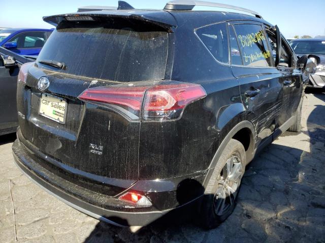 Photo 3 VIN: 2T3RFREVXGW470055 - TOYOTA RAV4 XLE 