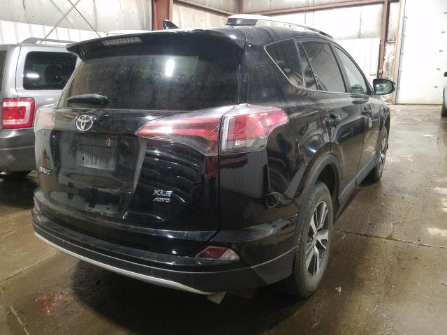 Photo 3 VIN: 2T3RFREVXGW509520 - TOYOTA RAV4 XLE 