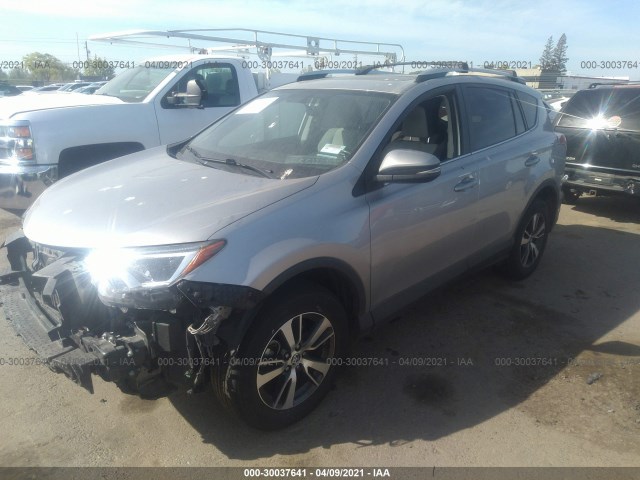 Photo 1 VIN: 2T3RFREVXGW515950 - TOYOTA RAV4 