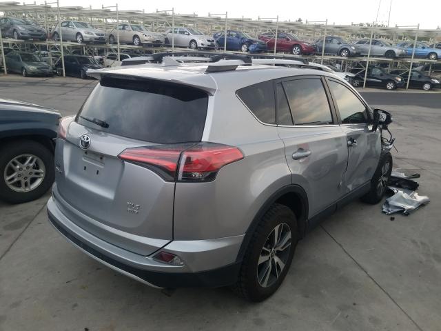 Photo 3 VIN: 2T3RFREVXGW523482 - TOYOTA RAV4 XLE 