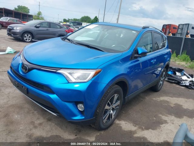 Photo 1 VIN: 2T3RFREVXJW745558 - TOYOTA RAV4 