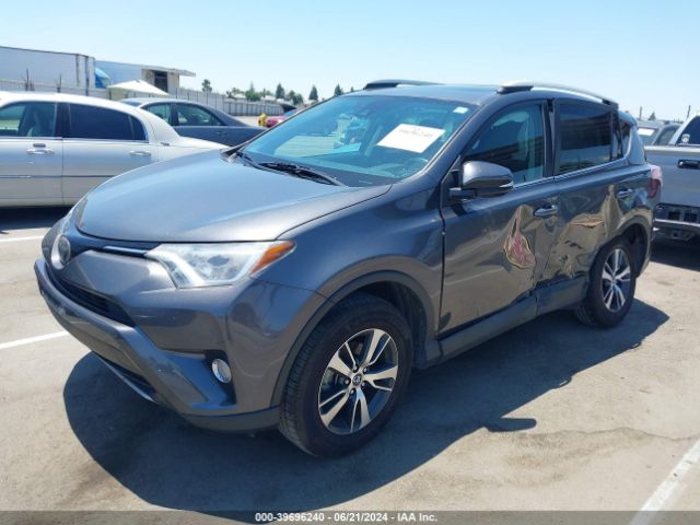 Photo 1 VIN: 2T3RFREVXJW811722 - TOYOTA RAV4 