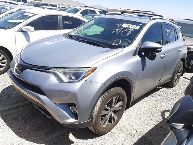 Photo 1 VIN: 2T3WFREV0GW239183 - TOYOTA RAV4 XLE 