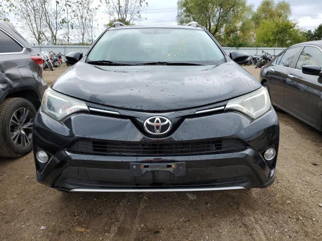 Photo 4 VIN: 2T3WFREV0GW257943 - TOYOTA RAV4 XLE 