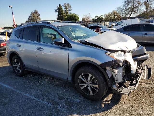 Photo 3 VIN: 2T3WFREV0GW297018 - TOYOTA RAV4 XLE 