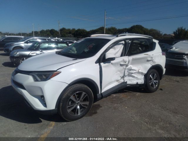 Photo 1 VIN: 2T3WFREV0GW309958 - TOYOTA RAV4 