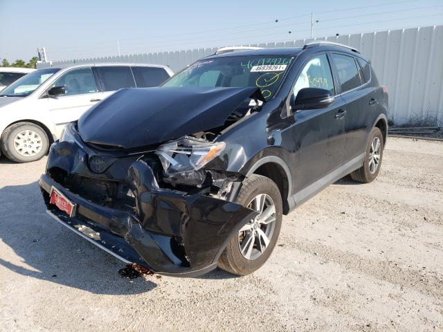 Photo 1 VIN: 2T3WFREV1GW254839 - TOYOTA RAV4 XLE 