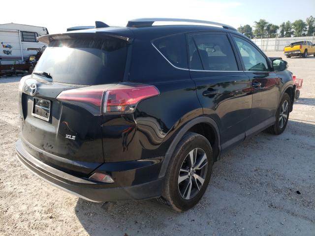 Photo 3 VIN: 2T3WFREV1GW254839 - TOYOTA RAV4 XLE 