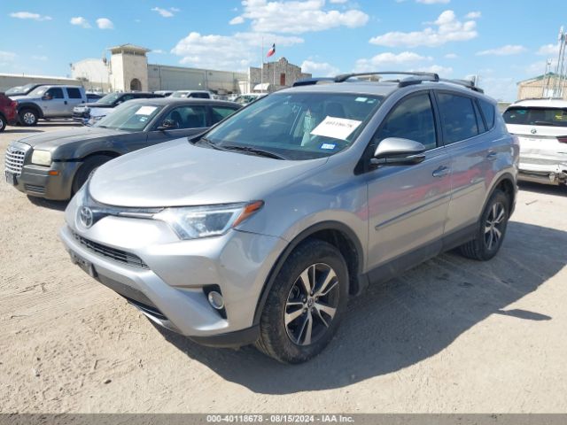 Photo 1 VIN: 2T3WFREV1GW268059 - TOYOTA RAV4 