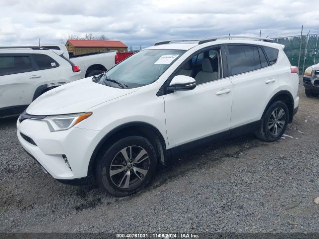 Photo 1 VIN: 2T3WFREV1GW281507 - TOYOTA RAV4 