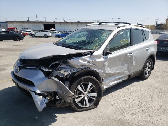 Photo 1 VIN: 2T3WFREV1GW283354 - TOYOTA RAV4 XLE 