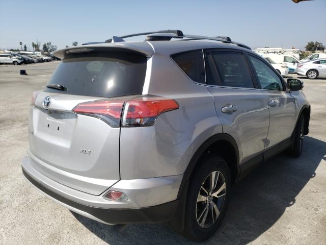 Photo 3 VIN: 2T3WFREV1GW283354 - TOYOTA RAV4 XLE 