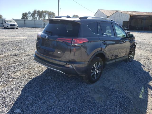 Photo 3 VIN: 2T3WFREV1GW300038 - TOYOTA RAV4 XLE 