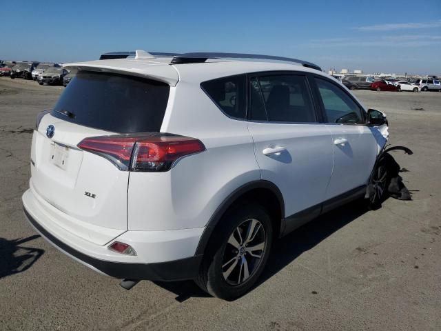 Photo 2 VIN: 2T3WFREV1GW304879 - TOYOTA RAV4 XLE 