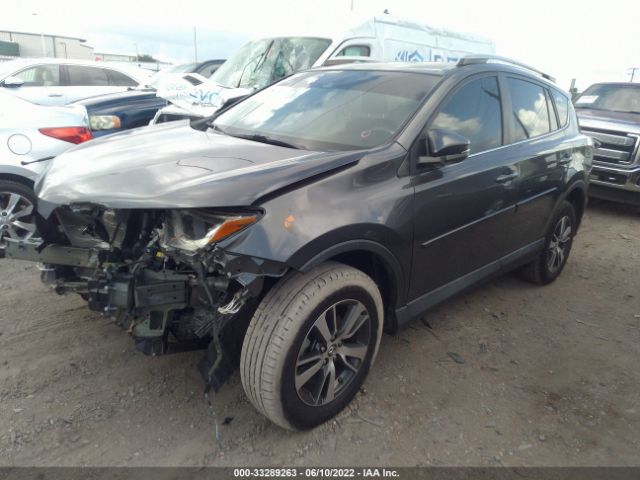 Photo 1 VIN: 2T3WFREV1JW417464 - TOYOTA RAV4 