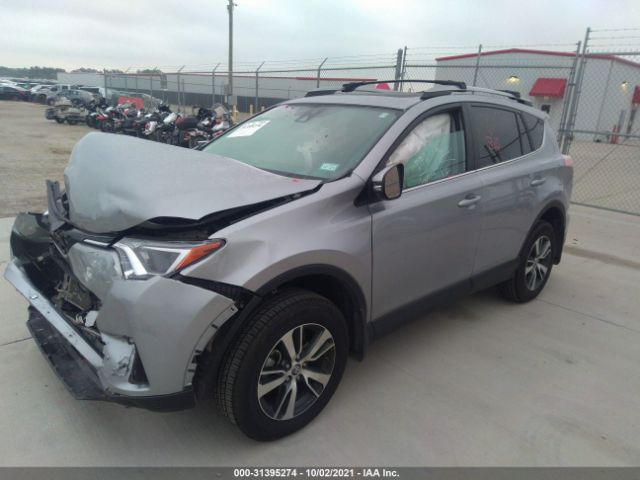 Photo 1 VIN: 2T3WFREV1JW498210 - TOYOTA RAV4 