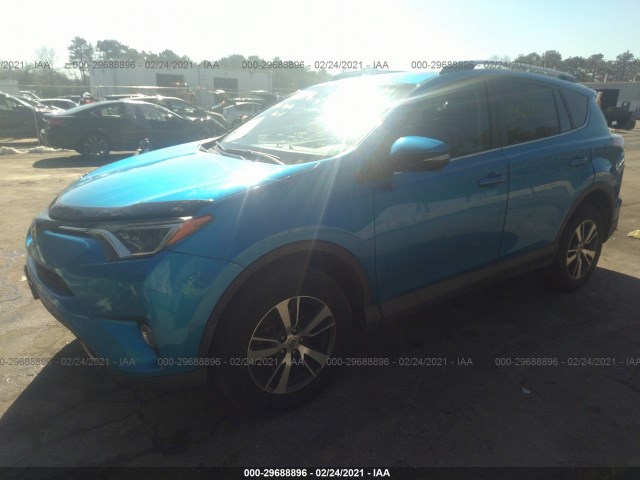 Photo 1 VIN: 2T3WFREV2GW254817 - TOYOTA RAV4 