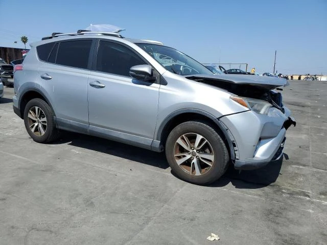 Photo 3 VIN: 2T3WFREV2GW285002 - TOYOTA RAV4 XLE 